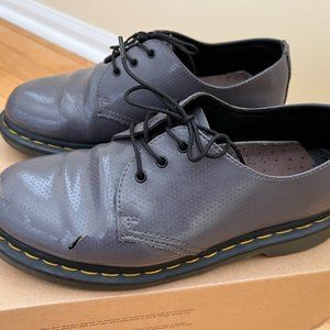 Grey patent leather AirWair Dr. Martens 1461